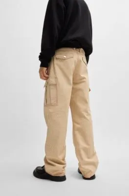 Pantalones HUGO x Les Benjamins relaxed fit de lona de algodón estampada